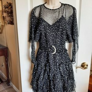 Dress size 4 unusual style,  very elegant & fun to wear.